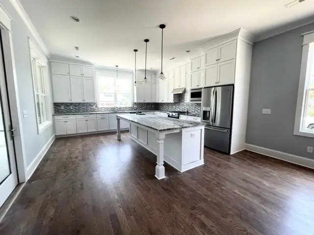 1.5-Story House Plan 4196 ft²: 5 Beds, Home Office, 5 Baths, Open Floor Plan, 3-Car Garage