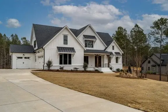 1.5-Story House Plan 4160 ft²: 4 Beds, Home Office, 4.5 Baths, Open Floor Plan, 3-Car Garage