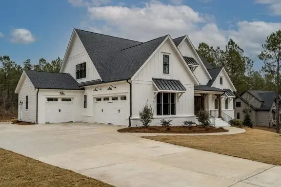 1.5-Story House Plan 4160 ft²: 4 Beds, Home Office, 4.5 Baths, Open Floor Plan, 3-Car Garage