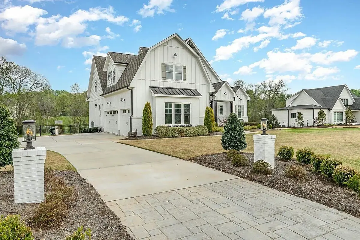1.5-Story House Plan 4143 ft²: 4 Beds, Home Office, 4.5 Baths, Open Floor Plan, 3-Car Garage