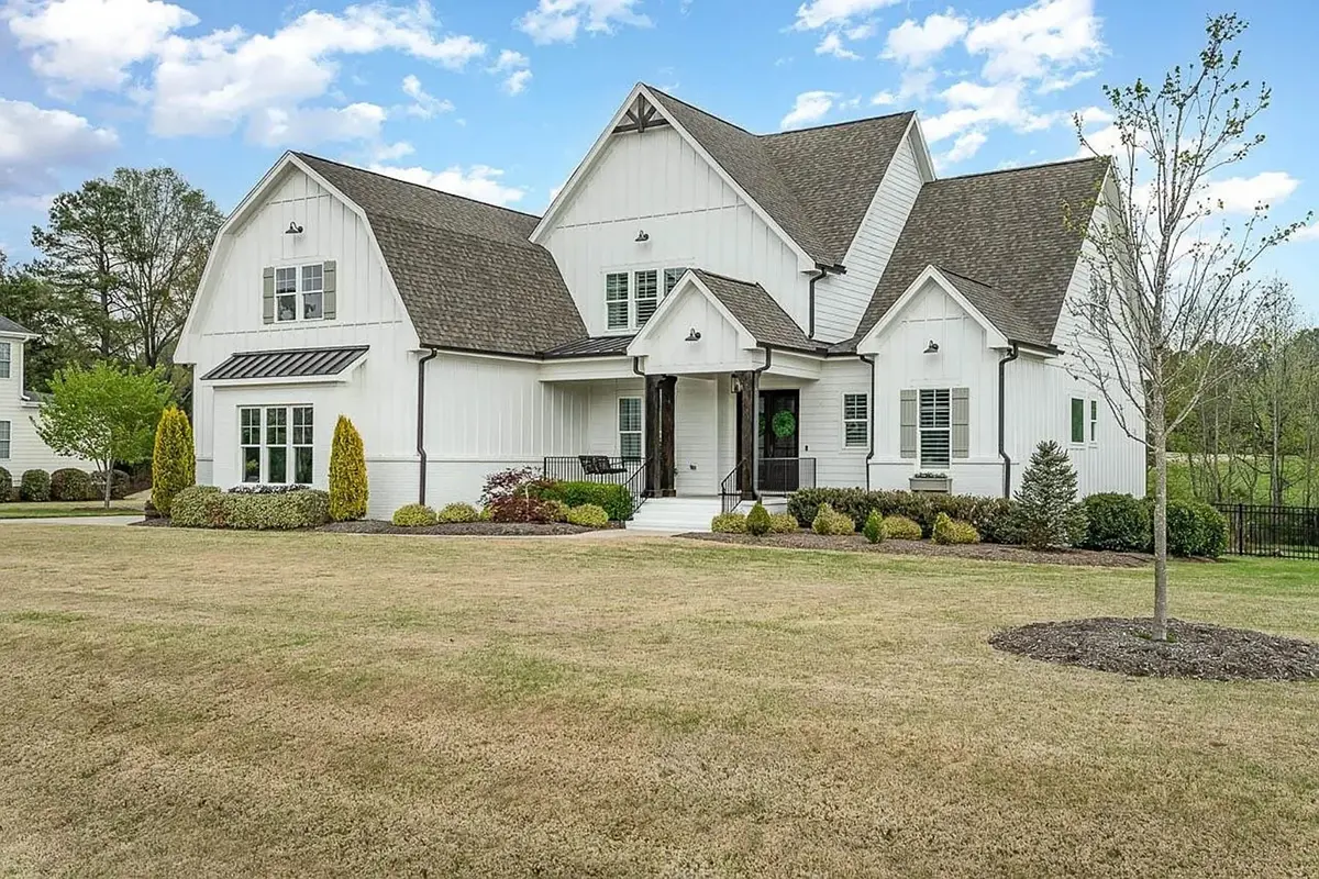 1.5-Story House Plan 4143 ft²: 4 Beds, Home Office, 4.5 Baths, Open Floor Plan, 3-Car Garage