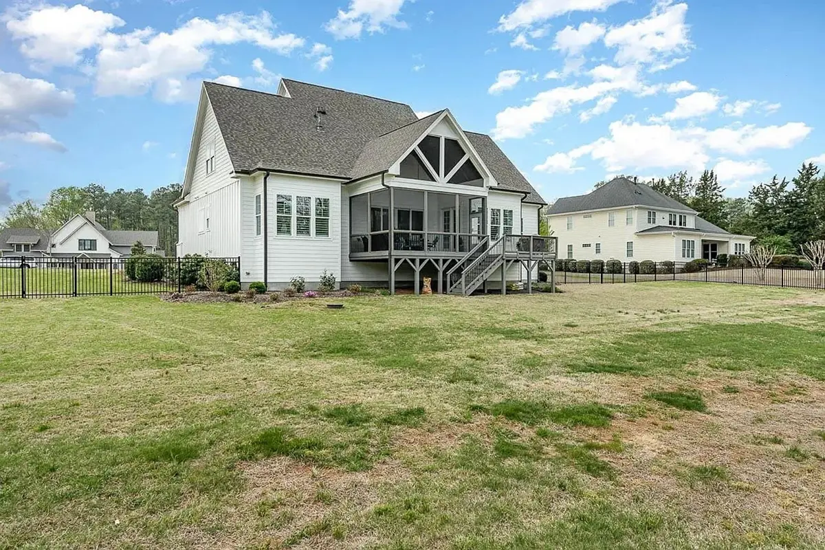 1.5-Story House Plan 4143 ft²: 4 Beds, Home Office, 4.5 Baths, Open Floor Plan, 3-Car Garage