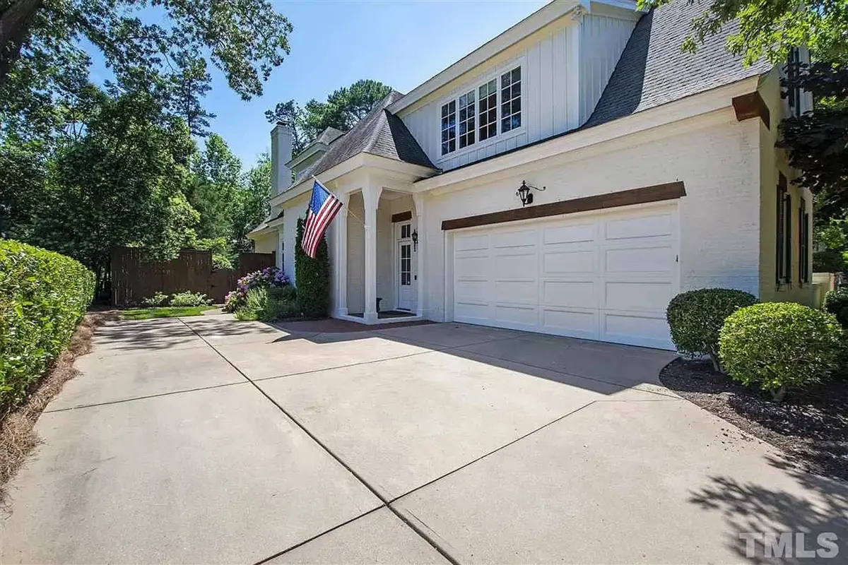 1.5-Story House Plan 5180 ft²: 4 Beds, Home Office, 4.5 Baths, Open Floor Plan, 2-Car Garage