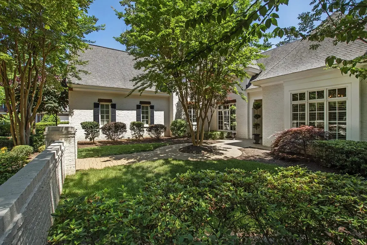 1.5-Story House Plan 5180 ft²: 4 Beds, Home Office, 4.5 Baths, Open Floor Plan, 2-Car Garage