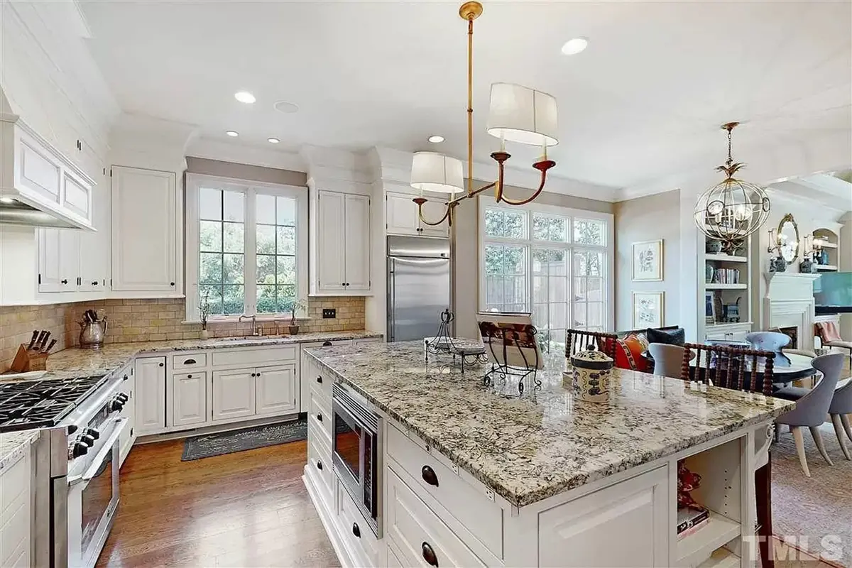 1.5-Story House Plan 5180 ft²: 4 Beds, Home Office, 4.5 Baths, Open Floor Plan, 2-Car Garage
