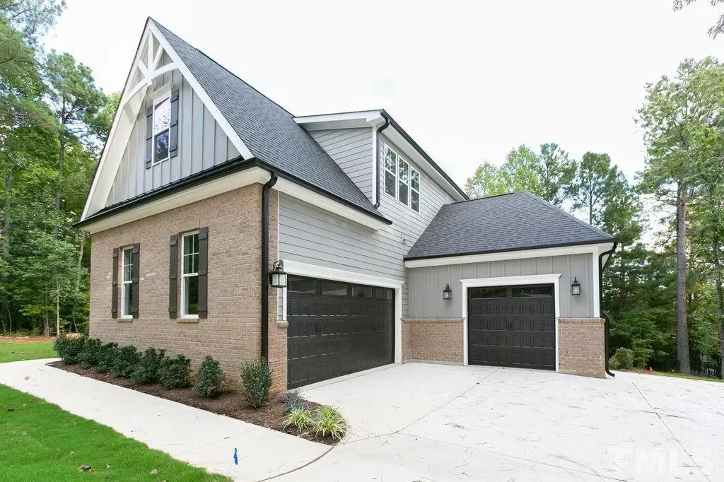 1.5-Story House Plan 3198 ft²: 4 Beds, Home Office, 3.5 Baths, Open Floor Plan, 3-Car Garage