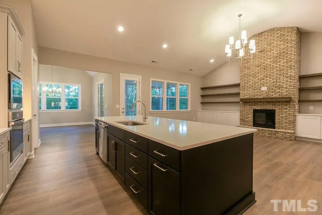 1.5-Story House Plan 3198 ft²: 4 Beds, Home Office, 3.5 Baths, Open Floor Plan, 3-Car Garage