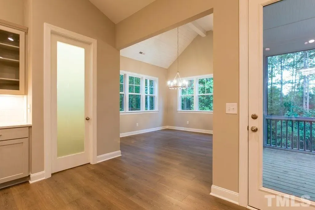 1.5-Story House Plan 3198 ft²: 4 Beds, Home Office, 3.5 Baths, Open Floor Plan, 3-Car Garage