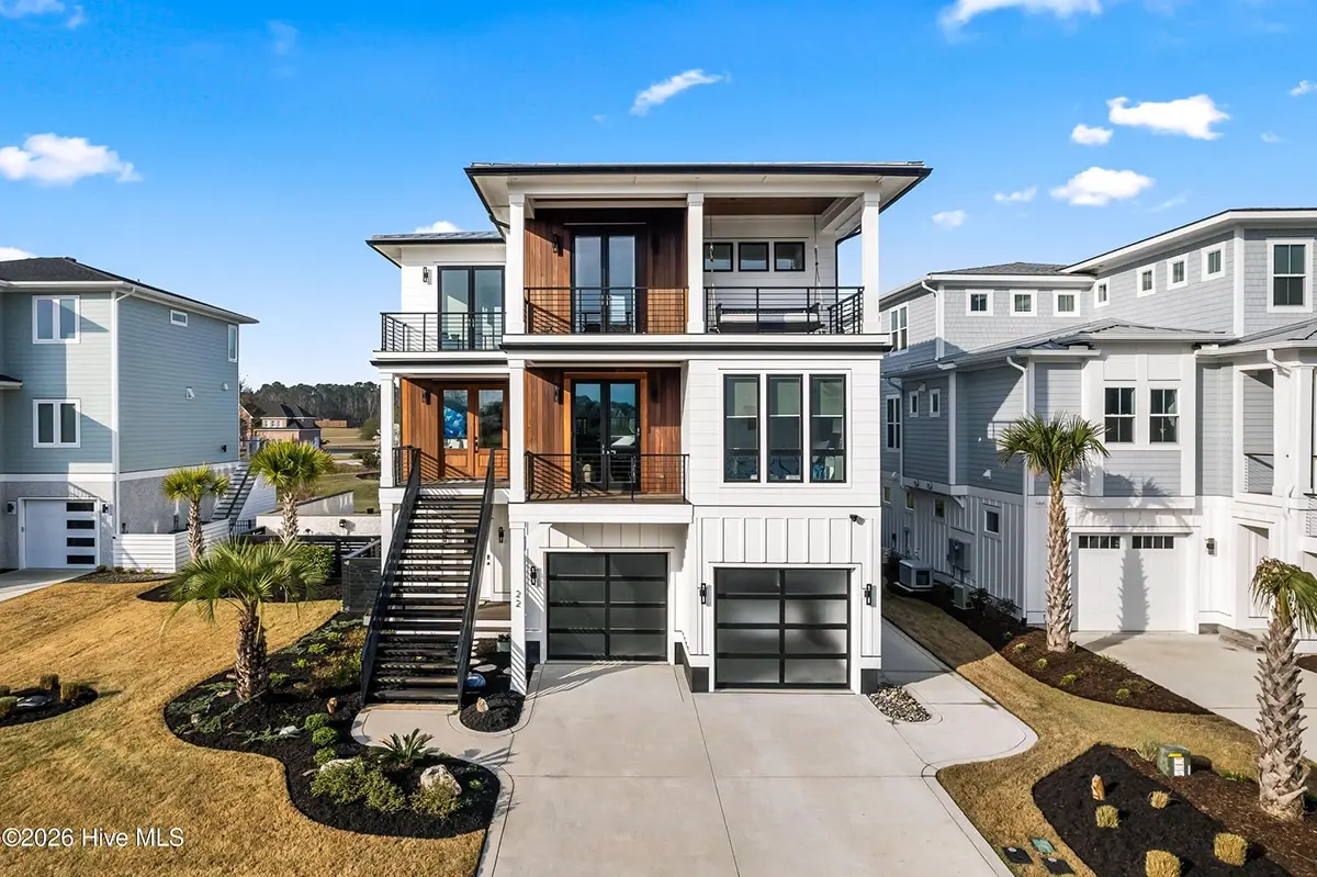 3-Story House Plan 4803 ft²: 5 Beds, Home Office, 5.5 Baths, Open Floor Plan, 4-Car Garage