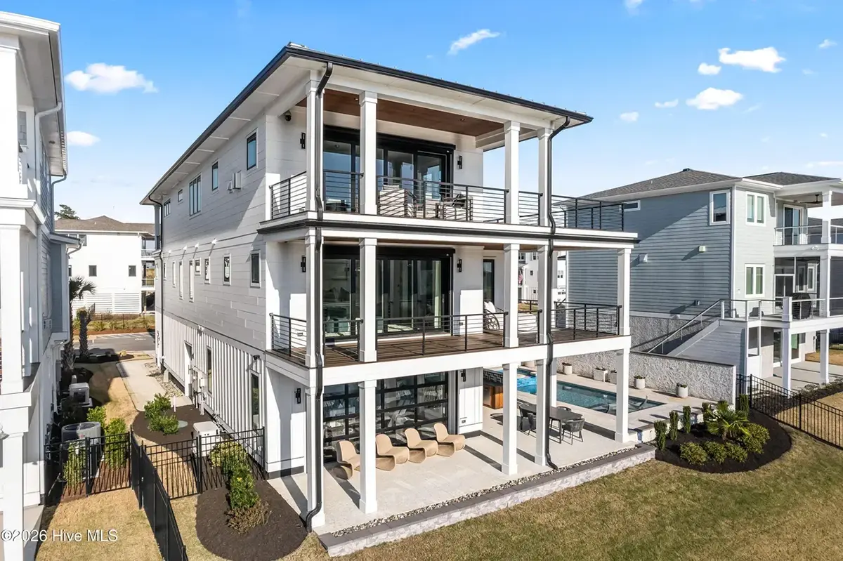 3-Story House Plan 4803 ft²: 5 Beds, Home Office, 5.5 Baths, Open Floor Plan, 4-Car Garage