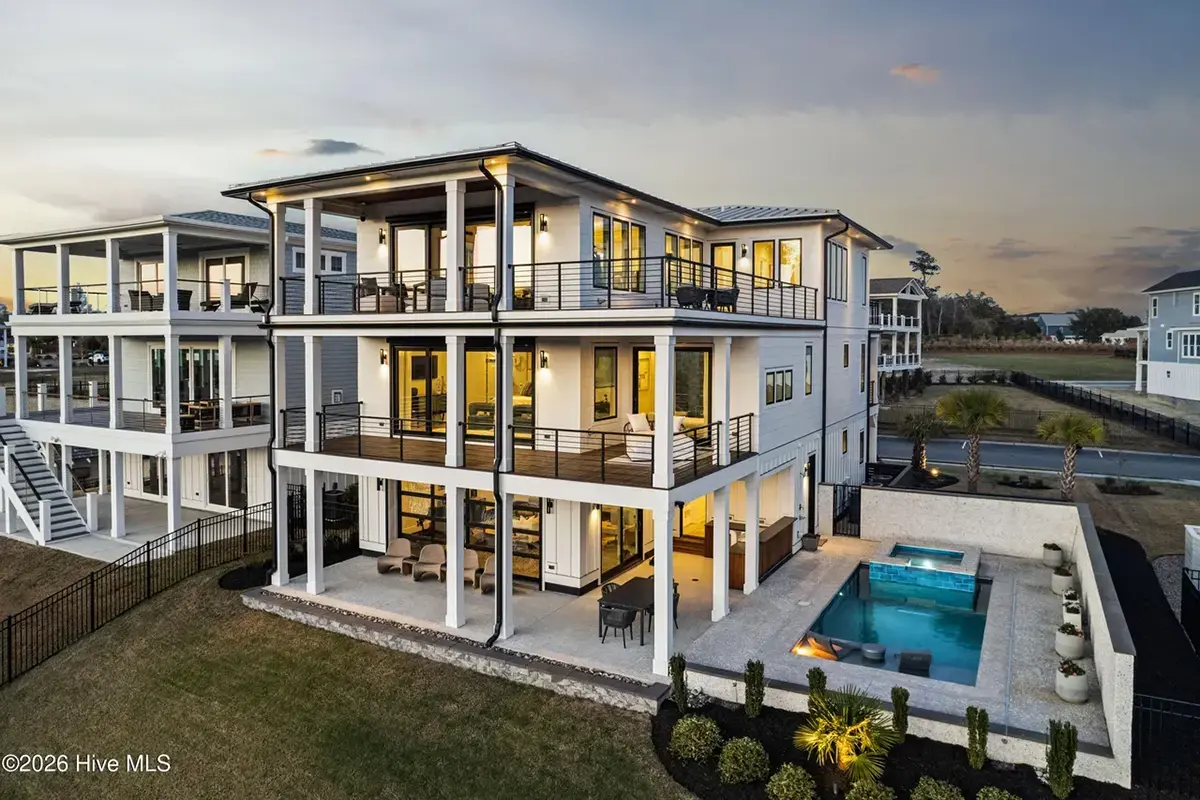 3-Story House Plan 4803 ft²: 5 Beds, Home Office, 5.5 Baths, Open Floor Plan, 4-Car Garage