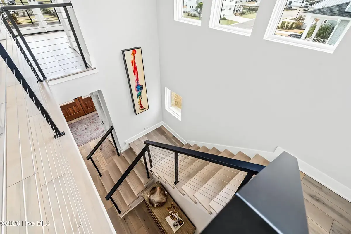 3-Story House Plan 4803 ft²: 5 Beds, Home Office, 5.5 Baths, Open Floor Plan, 4-Car Garage