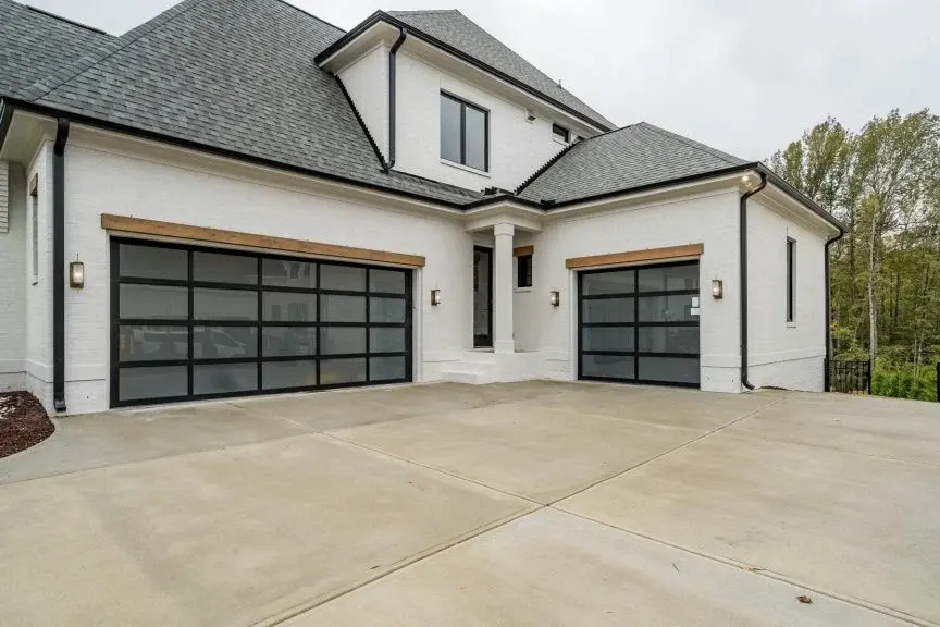 Actual Photos of House 16 – 2-Story House Plan with Basement 6450 ft²: 6 Beds, Home Office, 6.5 Baths, Open Floor Plan, 3-Car Garage — 36963R
