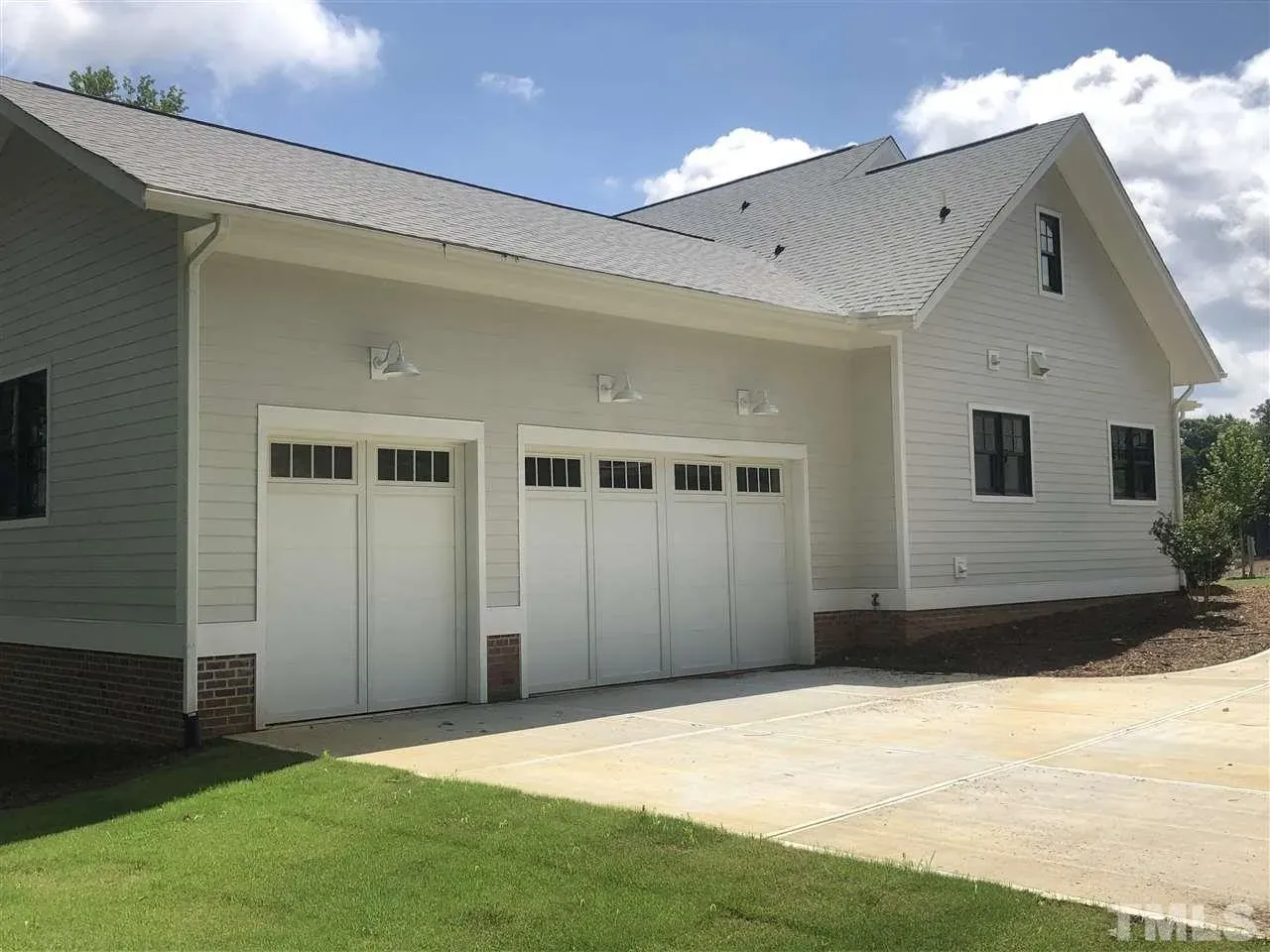 Actual Photos of House 18 – 1.5-Story House Plan 3669 ft²: 4 Beds, Home Office, 4.5 Baths, Open Floor Plan, 3-Car Garage — 11321R