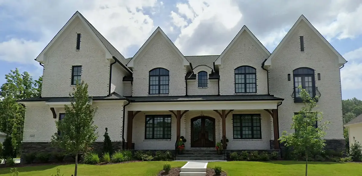 Actual Photos of House 6 – 2-Story House Plan with Basement 6952 ft²: 6 Beds, Home Office, 6 Baths, Open Floor Plan, 3-Car Garage — 35577R