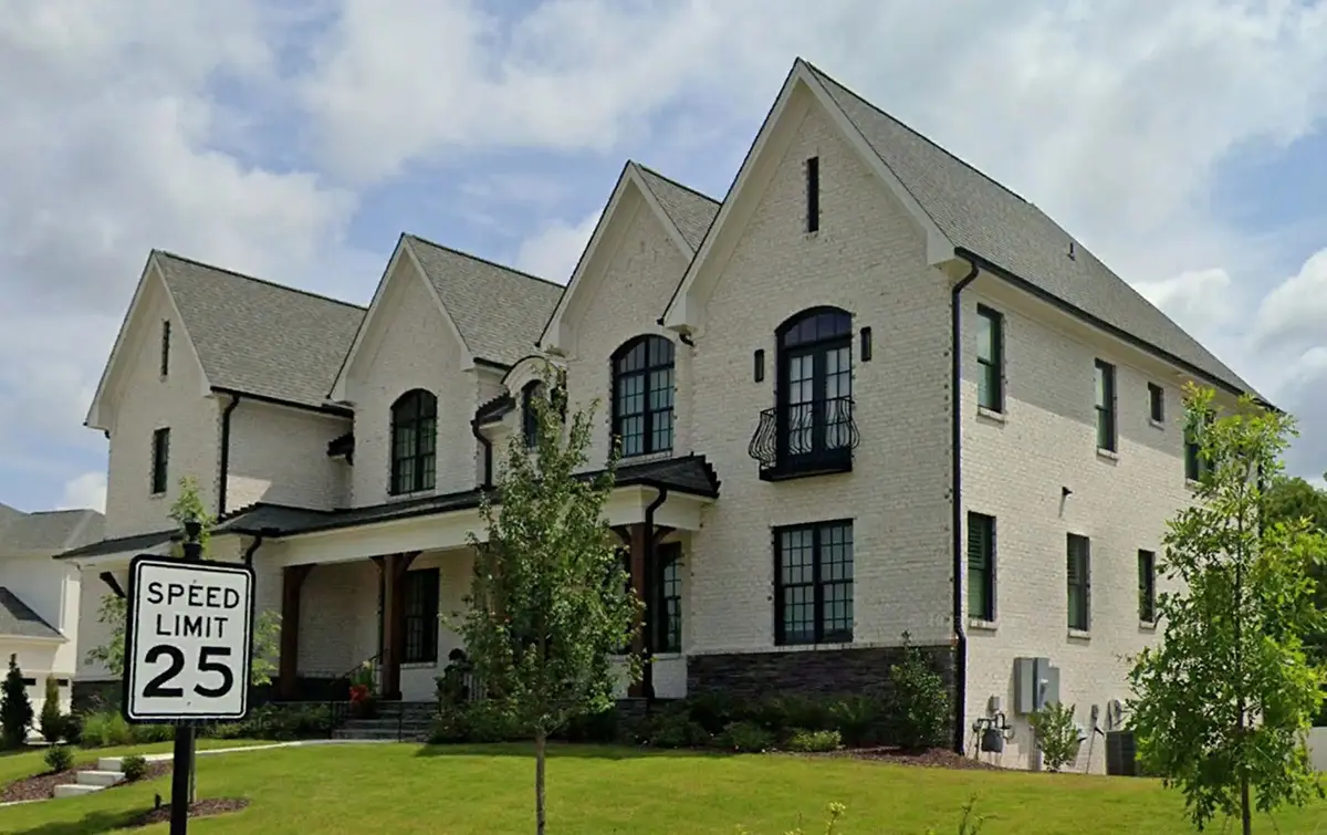 Actual Photos of House 5 – 2-Story House Plan with Basement 6952 ft²: 6 Beds, Home Office, 6 Baths, Open Floor Plan, 3-Car Garage — 35577R