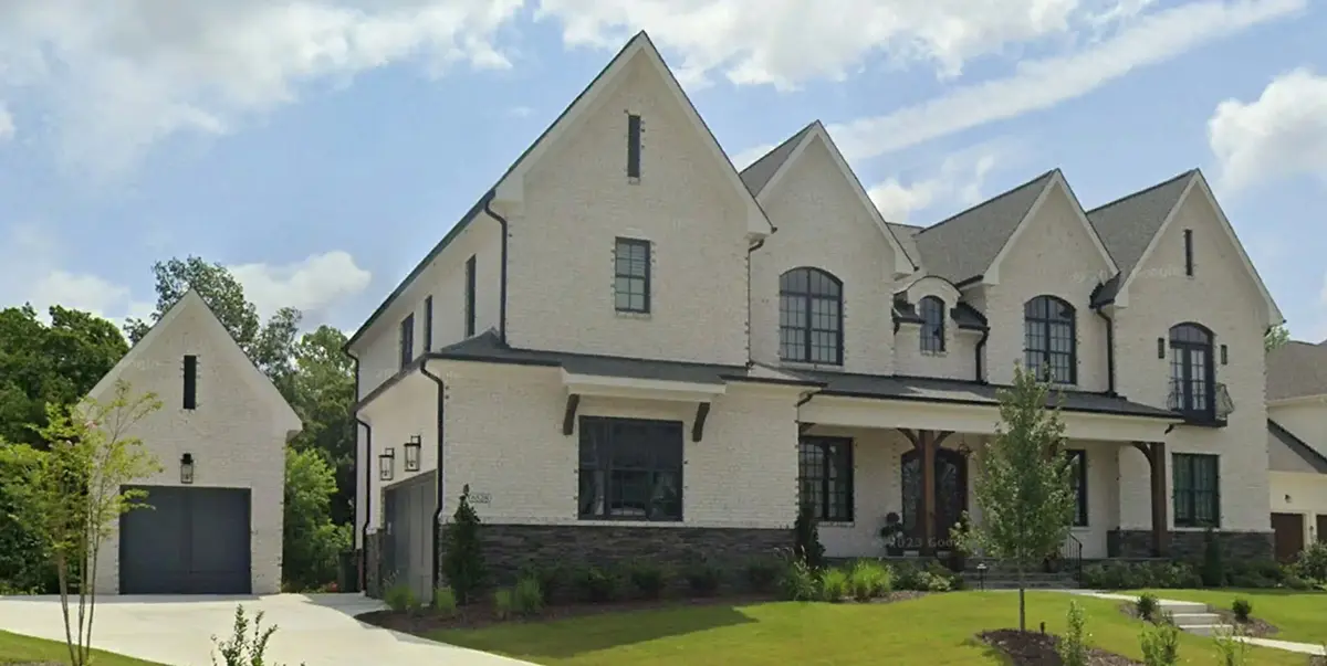 Actual Photos of House 7 – 2-Story House Plan with Basement 6952 ft²: 6 Beds, Home Office, 6 Baths, Open Floor Plan, 3-Car Garage — 35577R