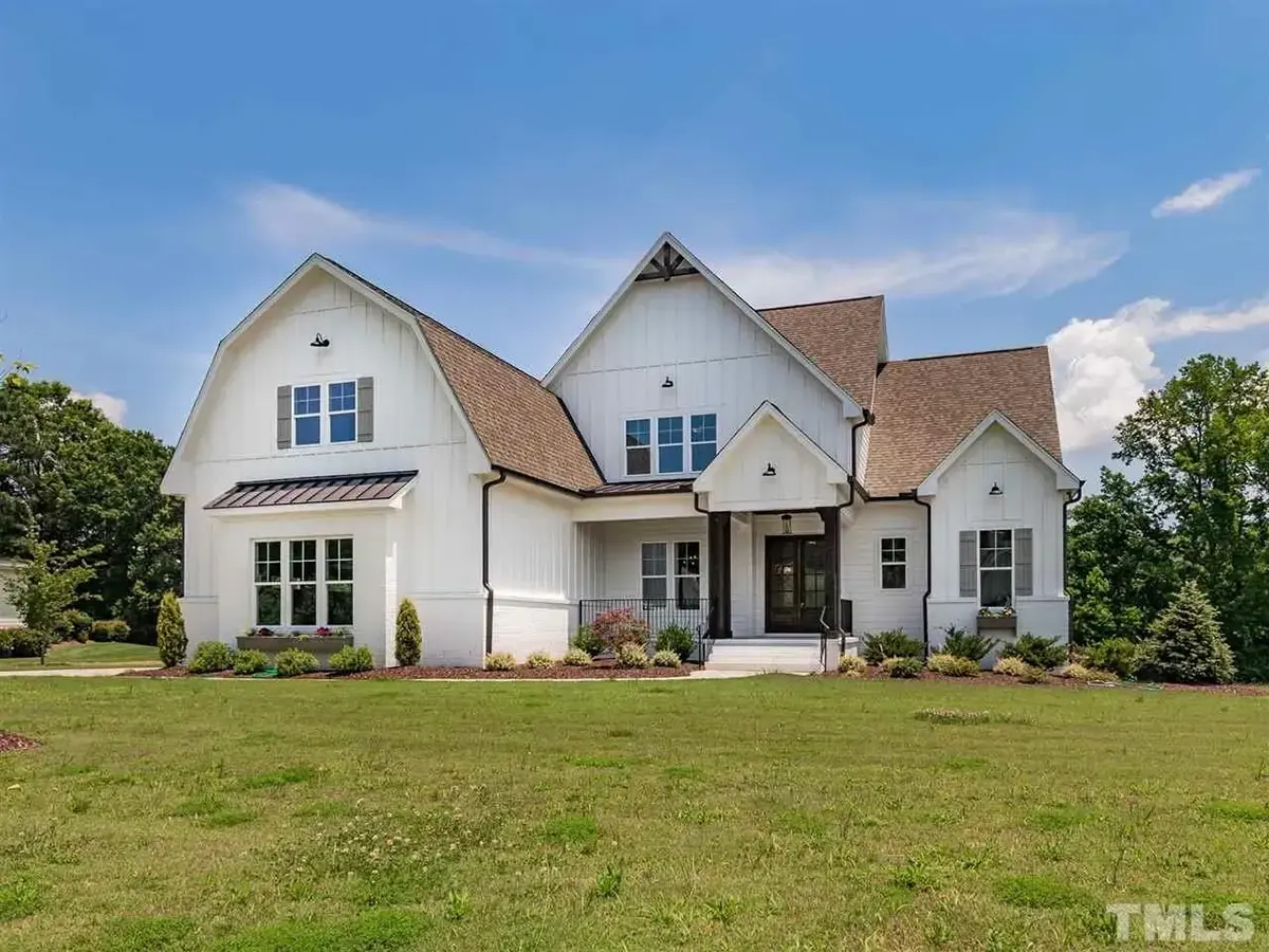 Main Images 3 – 1.5-Story House Plan 3912 ft²: 5 Beds, 4.5 Baths, Open Floor Plan, 3-Car Garage — 64220R