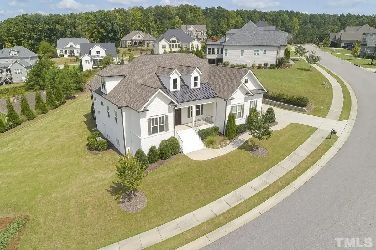 Actual Photos of House 16 – 1.5-Story House Plan 3030 ft²: 4 Beds, 3.5 Baths, Open Floor Plan, 3-Car Garage — 59002R